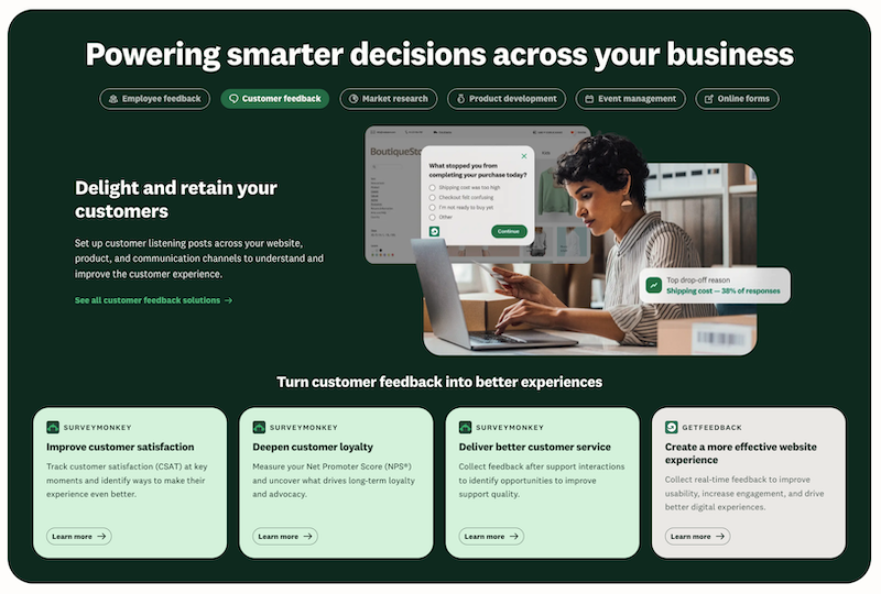 SurveyMonkey homepage bento grid reading Powering smarter decisions across your business, with tabs for employee feedback, customer feedback, market research, and more