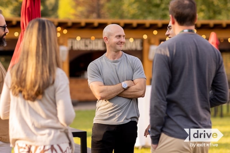 Dave Gerhardt smiling with attendees at Drive 2026 in Stowe, VT